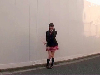 Japanese schoolgirl fucks in her white panties while driving in Tokyo