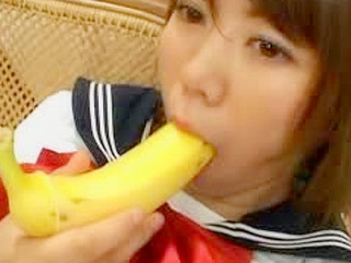 Japanese schoolgirl gets fucked by a banana inducing pearl necklace